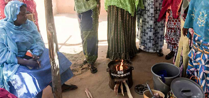 Watching an efficient cookstove demonstration in Ansongo, Mali.
